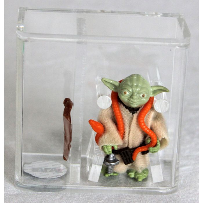 yoda figure with orange snake